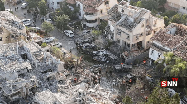 이란의 보복 미사일 공격으로 폐허가 되다시피한 이스라엘 일부 지역 모습/TV 영상 캡처